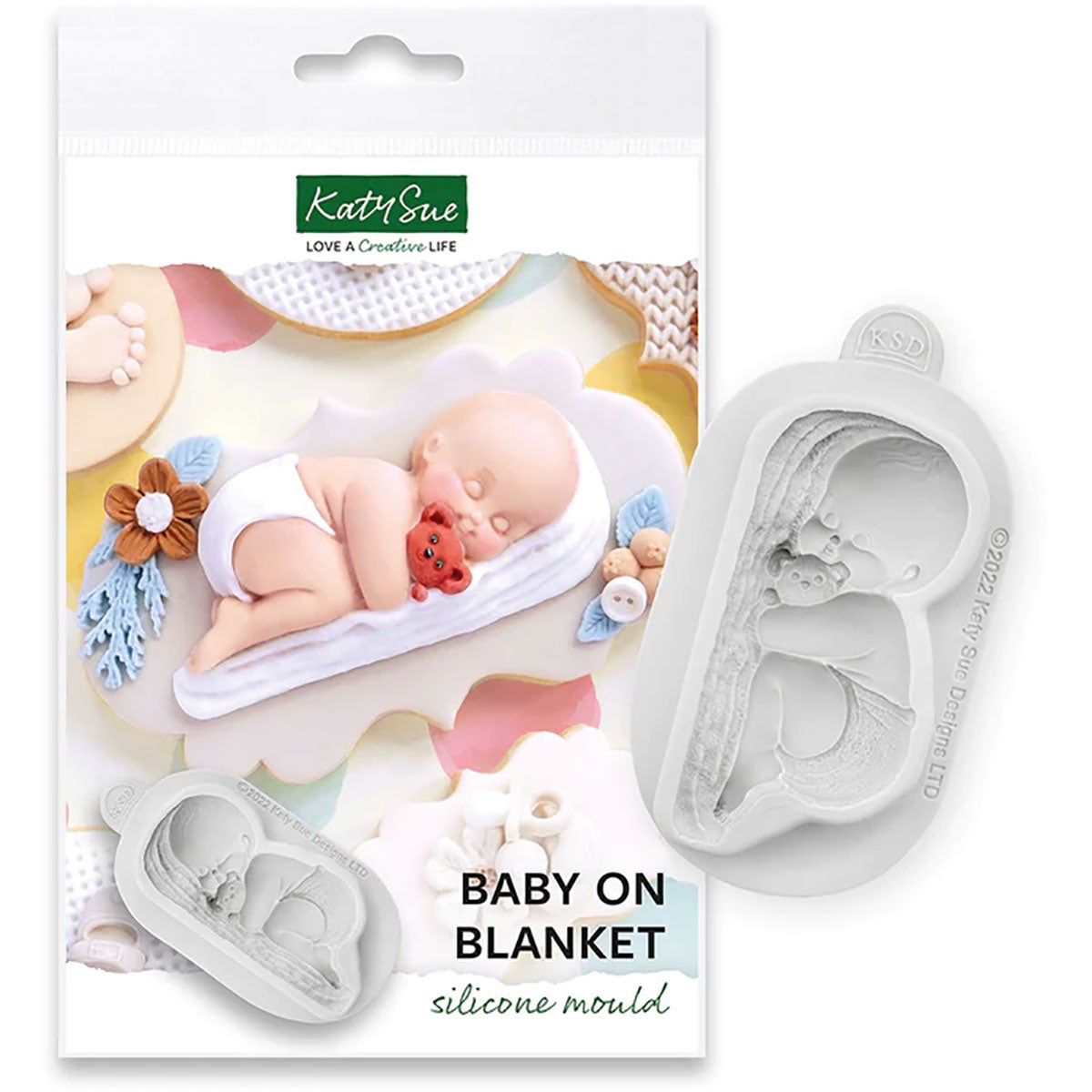 Katy Sue Mould Button Baby on Blanket